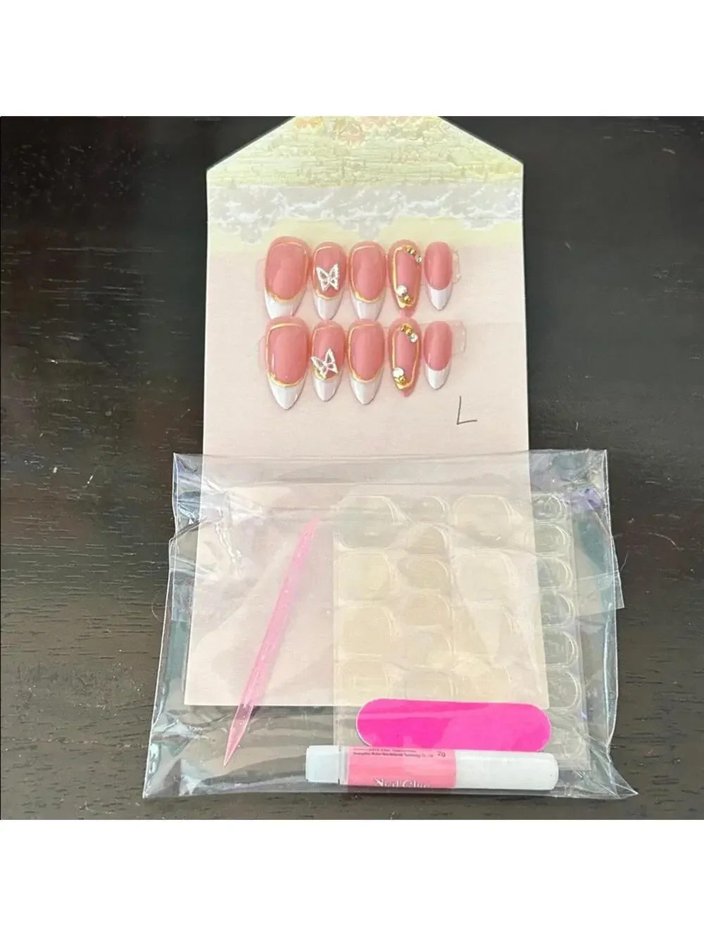 Pink and White French Nail Set with Gold Accents